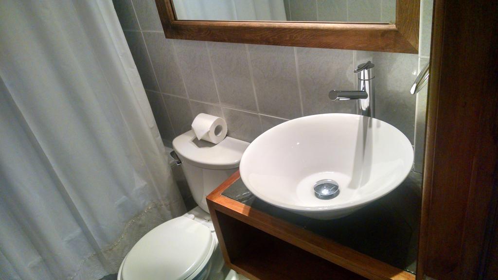 Hostal Buena Estancia Punta Arenas Habitación foto
